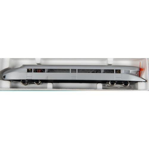 85 - 2x Marklin HO gauge 3-rail locomotives. A Rail Zeppelin (3077) in silver. A DB 2-unit Railcar (3076)... 