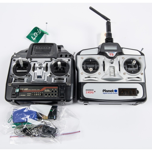 254 - 2 hand-held radio control units. A Planet T5 advanced 2.4GHZ, no instructions and the other a Sanwa ... 