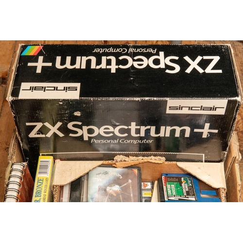 258 - A Sinclair ZX Spectrum Personal Computer. Together with 50+ games on cassette and 3.5 inch floppy di... 