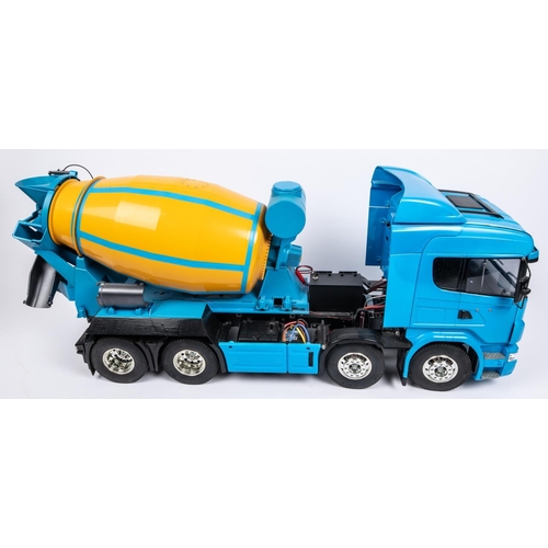 260 - An impressive Tamiya Scania V8 4 axle cement truck. An example with an extended chassis, incorporati... 