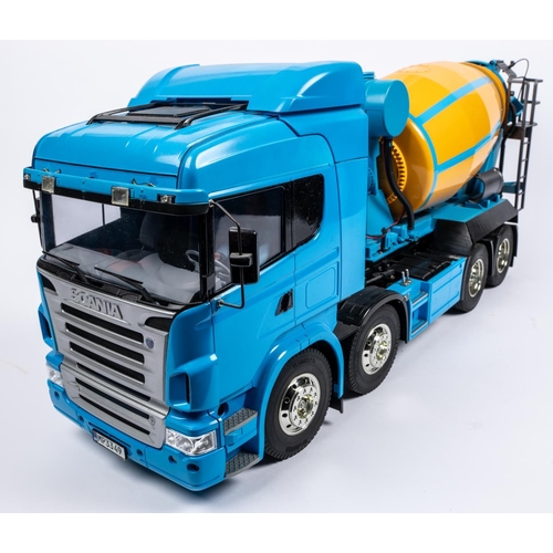 260 - An impressive Tamiya Scania V8 4 axle cement truck. An example with an extended chassis, incorporati... 