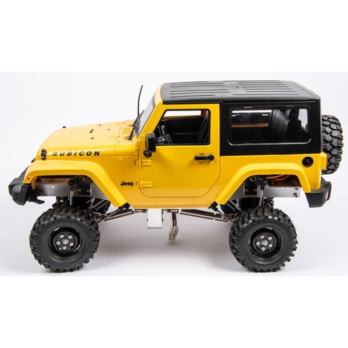 262 - A 1:10 scale radio controlled JEEP. With a scratch built alloy chassis with a TLT drive/axles with o... 