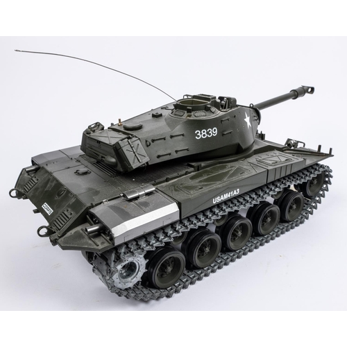 264 - 2 radio controlled tanks. A WW2 American M41A3 tank, 50cm overall. Together with a Heng Long German ... 