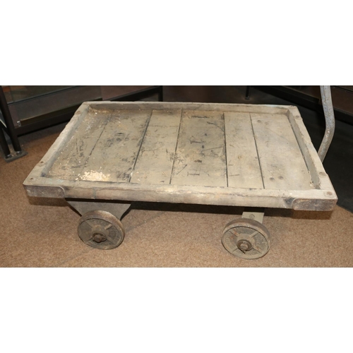 166 - An early 20th Century 4-wheel wooden hand trolley. Industrial trolley for railway etc use by Slingsb... 