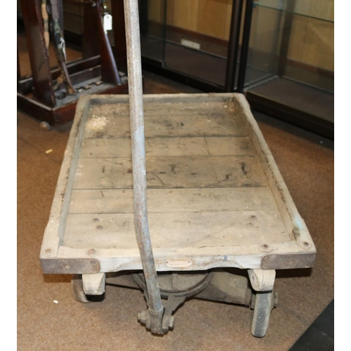 166 - An early 20th Century 4-wheel wooden hand trolley. Industrial trolley for railway etc use by Slingsb... 