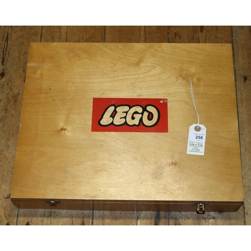 256 - An unusual German issue early 1970s Lego System set in a wooden box. Including Building blocks, whee... 