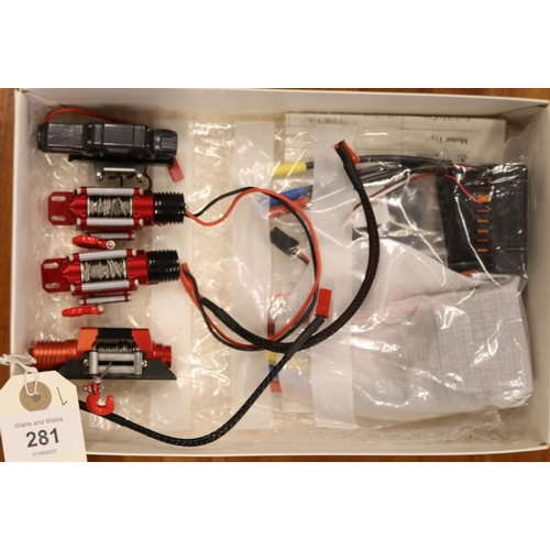 281 - Radio Control parts. A GNLRC 45A ESCx2 plus a programming card. Also 4x electric RC vehicle winches.... 