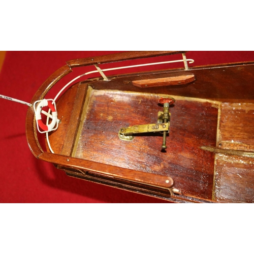 297 - A wooden scale model of an African style steam driven River Boat. Named 