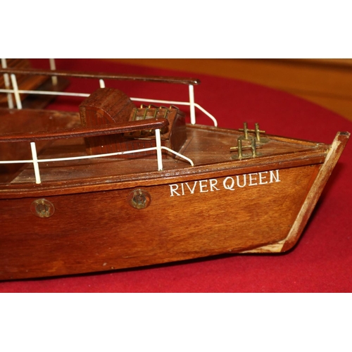 297 - A wooden scale model of an African style steam driven River Boat. Named 