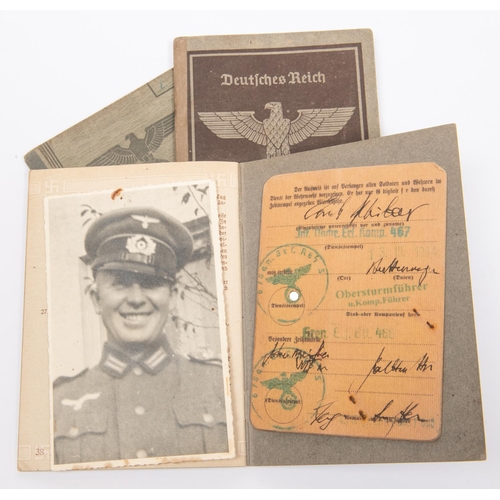 101 - A Third Reich Wehrpass, two similar Arbeitsbuch, and a Dienstausweis. GC £30-50