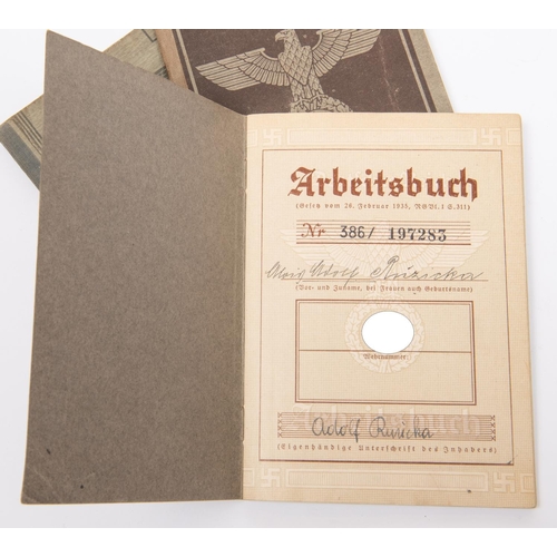 101 - A Third Reich Wehrpass, two similar Arbeitsbuch, and a Dienstausweis. GC £30-50