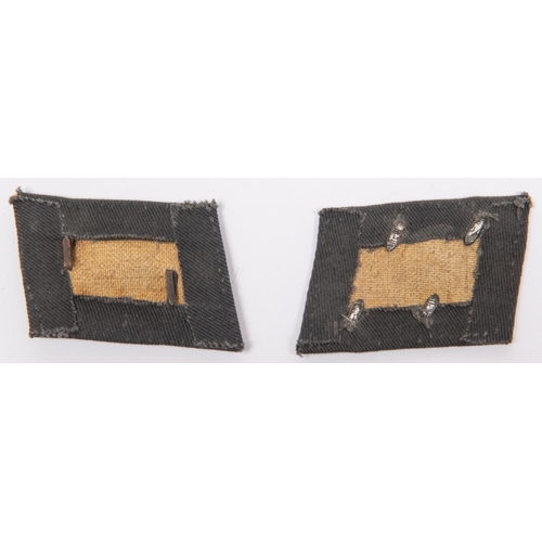 106 - A pair of Third Reich SS Latvian Volunteers collar patches, to Oberscharfuhrer. GC £250-300