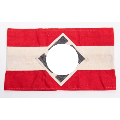 115 - A Hitler Youth linen armband, with applied printed swastika. GC £50-80