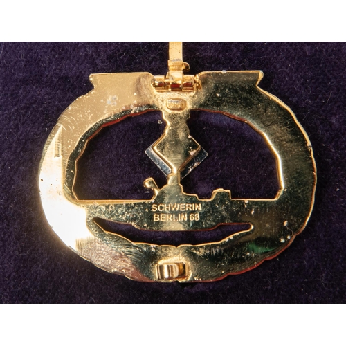 124 - A good post war copy of a Third Reich U Boat badge with diamonds, in its case. VGC £200-250