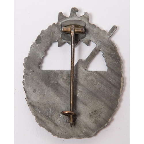 127 - A Third Reich Coastal Artillery badge, grey metal, flat back with round pin. GC £50-60