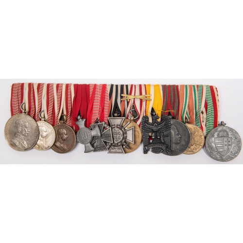 136 - Austro Hungarian WWI group of eleven medals: Franz Joseph large and small silver Bravery medal, bron... 