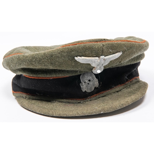 163 - A good quality copy of a Third Reich Waffen SS peaked cap, field grey with alloy badges. GC £300-350