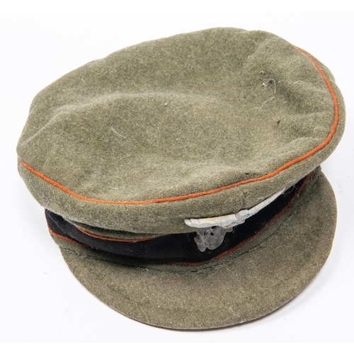 163 - A good quality copy of a Third Reich Waffen SS peaked cap, field grey with alloy badges. GC £300-350