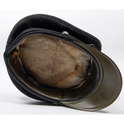 165 - An Allgemeine SS OR's peaked cap, possibly an old film prop replica, GC (splits to lining) £60-80