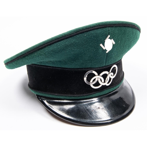 170 - A Third Reich Olympic official's SD cap, green cloth with plated mounts. GC £270-300