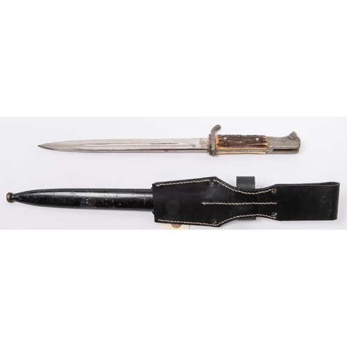 180 - A Third Reich parade bayonet, staghorn grip on plated hilt, blade 9½