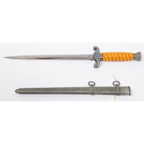 188 - A Third Reich Army officer's dagger, by WKC Solingen, with grey metal hilt and orange grip, in its s... 