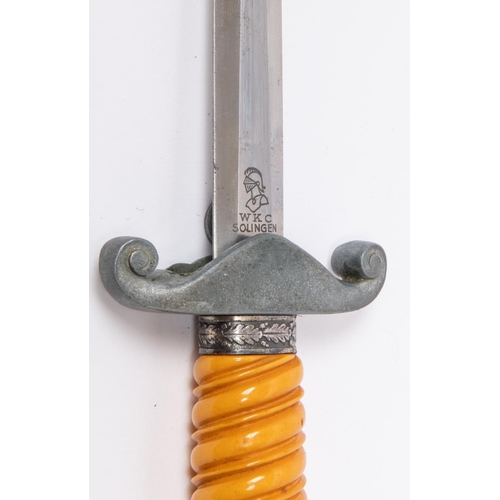 188 - A Third Reich Army officer's dagger, by WKC Solingen, with grey metal hilt and orange grip, in its s... 