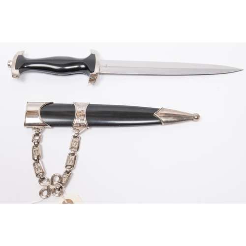 195 - A copy of an SS officers chained dagger, blade marked 