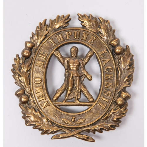 238 - A brass cross belt badge of the 1st Aberdeenshire Rifle Volunteers, 1860-1879 (?), flat with 3 lugs.... 