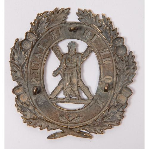 238 - A brass cross belt badge of the 1st Aberdeenshire Rifle Volunteers, 1860-1879 (?), flat with 3 lugs.... 