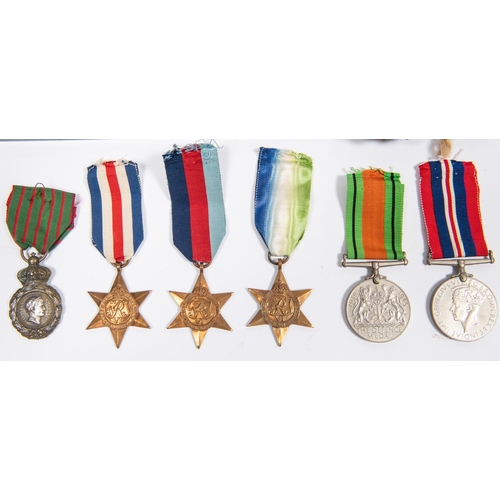 267 - Approximately 2kg weight of military badges, buttons, etc, including 5 WWII medals: 1939-45 star, F&... 