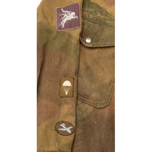 270 - A scarce WWII Airborne Troops Dennison smock, camouflage with half zip and crotch gussett strap, Peg... 