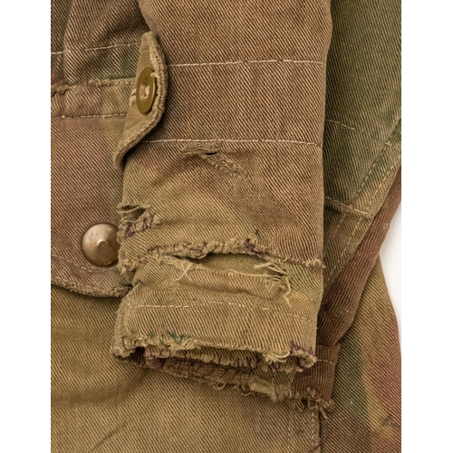 270 - A scarce WWII Airborne Troops Dennison smock, camouflage with half zip and crotch gussett strap, Peg... 