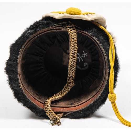 296 - A good example of an ORs busby of the 19th Hussars, dated 1911, black fur with white bag, white plum... 