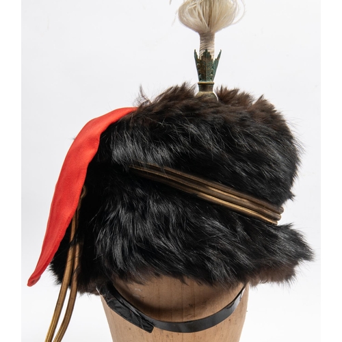 299 - An officer's sable busby of the Royal Horse Artillery, red bag, tall white feather plume in gilt hol... 