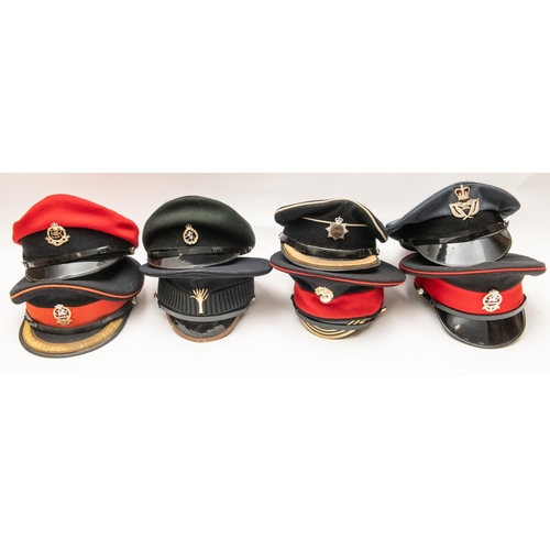 306 - 8 military peaked caps comprising: RASC officer, Welsh Guards NCO, Grenadier Guards Senior NCO, Quee... 