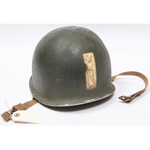 315 - A WWII US Army steel helmet, original O.D. finish with front marking of Division and 2 bar rank, fro... 