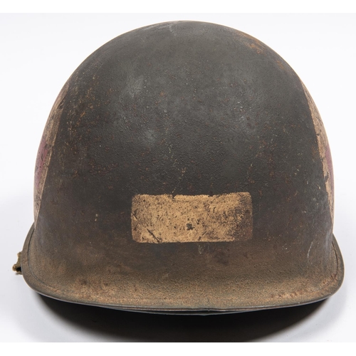 316 - A WWII American medic's steel helmet, with webbing chinstrap and fibre liner, the front painted with... 