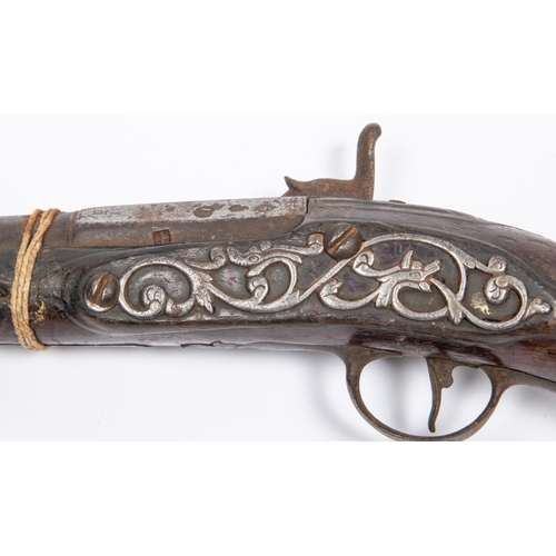 428 - A relic late 17th century 30 bore holster pistol converted to percussion, the three stage barrel red... 