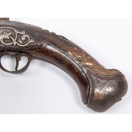 428 - A relic late 17th century 30 bore holster pistol converted to percussion, the three stage barrel red... 