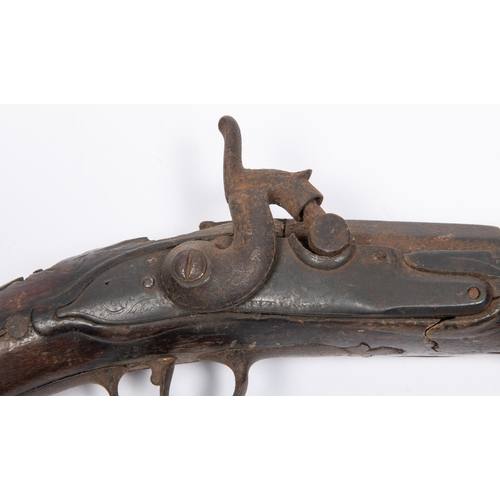 428 - A relic late 17th century 30 bore holster pistol converted to percussion, the three stage barrel red... 