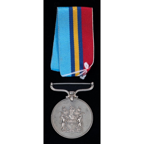 71 - Rhodesian Service Medal issued for anti terrorist work: (PR86889 Rfn M.J. Long) EF with citation det... 