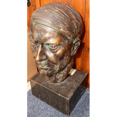 97 - A large bronze head of Adolf Hitler, mounted on a rectangular marble plinth, overall height 26