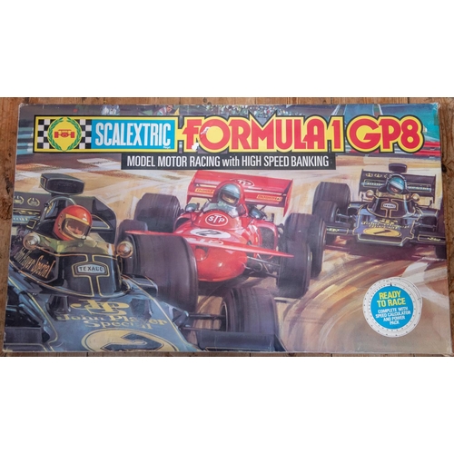 55 - A large quantity of Scalextric with boxed sets and accessories. Including 3x sets; a Formula 1 GP8 s... 