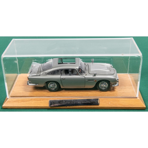 153 - Danbury Mint James bond Aston Martin DB5 ( silver issue). Comes complete with Certificate and paperw... 