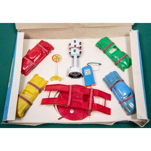 157 - 1950s Empire made plastic garage set, Contents are 4 cars, 1 car lift, 1 set of traffic lights, 1 pe... 