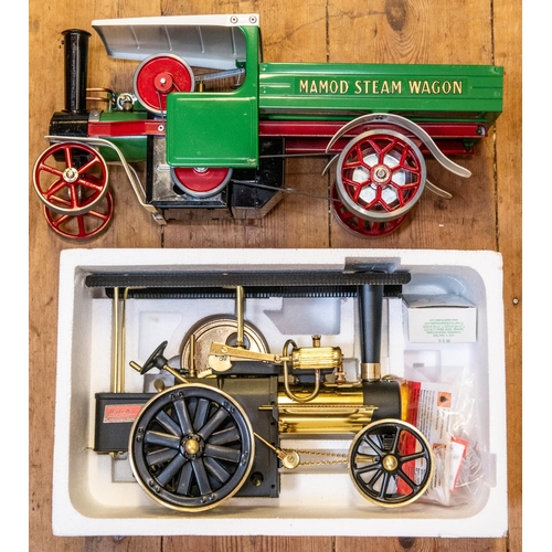 172 - 2 live steam models. A Wilesco Steam Traction Engine. In polished bras with black parts-firebox, roo... 