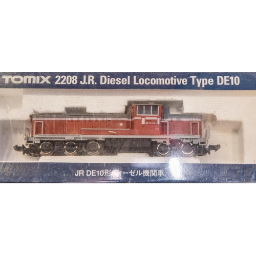 20 - 4 Japanese produced 'N' gauge Locomotives. 3x Tomix: 2148 J.R. Electric Locomotive EF81 (Rsinbow). A... 