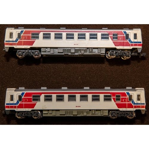 23 - 3 Japanese 'N' gauge Motive Power items. A Tomix J.R.Interurban Series 115.2000 3-car Multiple Unit.... 