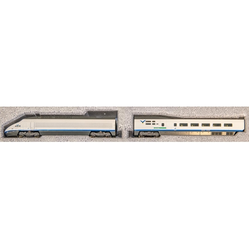 24 - A KATO 'N 'gauge Train Pack. (10719-1). An AVE Serie 100 10 car high-speed train comprising 2 power ... 